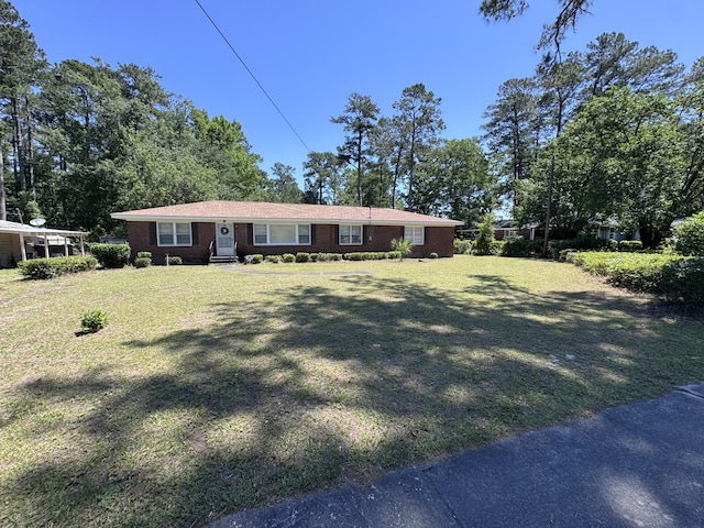 686 W Pine St, Varnville, SC 29944 - view of front of property with a front lawn and brick siding