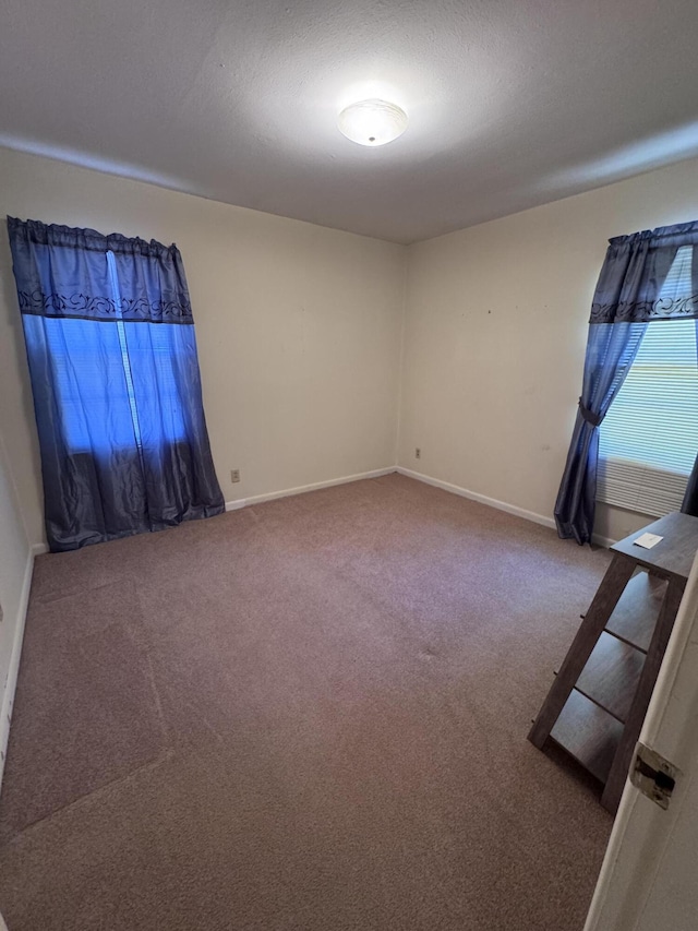 686 W Pine St, Varnville, SC 29944 - carpeted spare room featuring baseboards