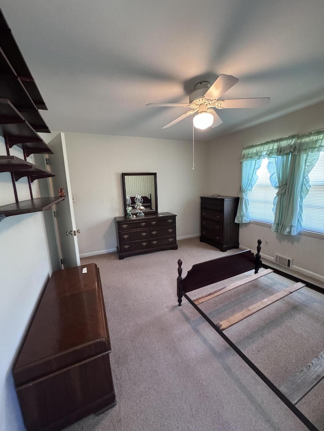 686 W Pine St, Varnville, SC 29944 - bedroom with carpet flooring, a ceiling fan, and baseboards