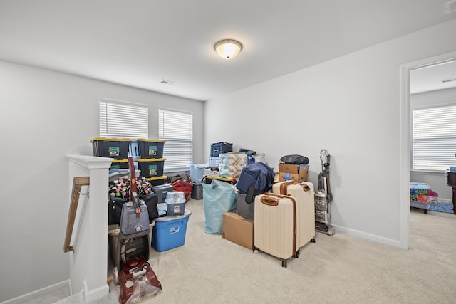 carpeted bedroom featuring baseboards