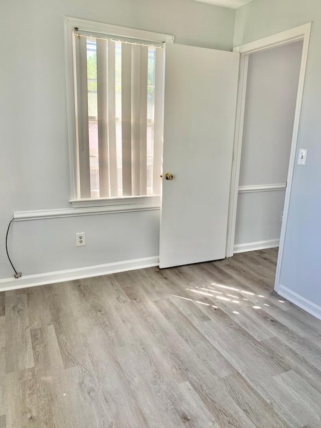 105 S Merriman Rd, Georgetown, SC 29440 - empty room featuring wood finished floors and baseboards
