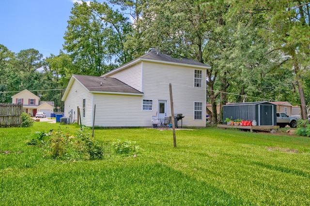 2538 Wayne Scott Ct, Charleston, SC 29414 - back of property featuring a yard and a storage unit
