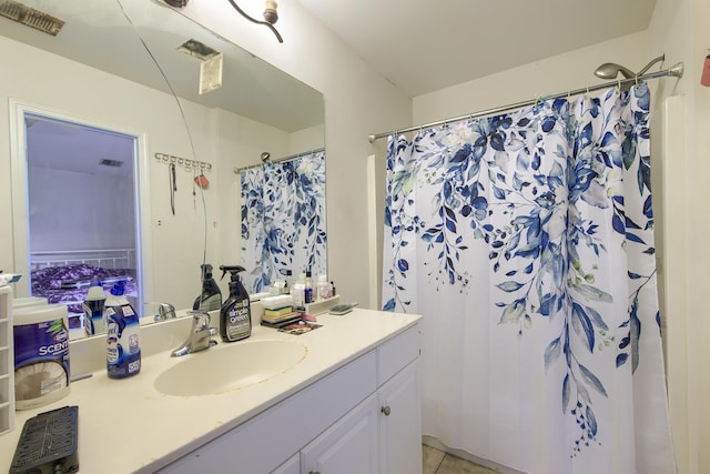 2538 Wayne Scott Ct, Charleston, SC 29414 - bathroom featuring vanity, tile patterned flooring, and curtained shower