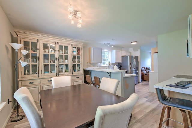 2538 Wayne Scott Ct, Charleston, SC 29414 - dining room featuring light wood-style flooring and baseboards