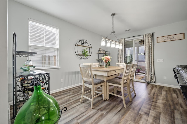 111 Nolin Rd, Moncks Corner, SC 29461 - dining room featuring wood finished floors, baseboards, and a ceiling fan