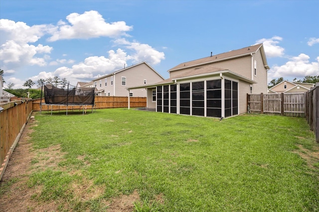 111 Nolin Rd, Moncks Corner, SC 29461 - back of property with a trampoline and a sunroom