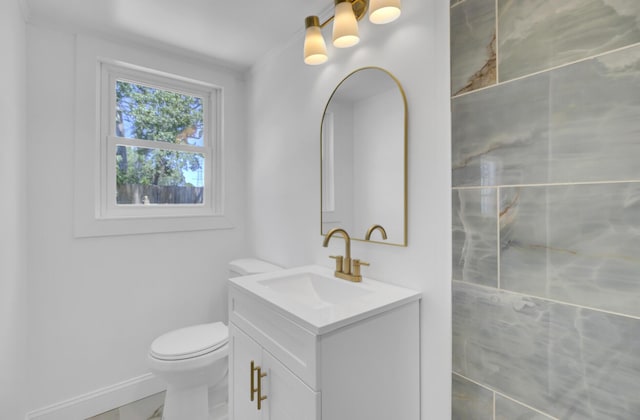 3428 Plaza Ln, North Charleston, SC 29420 - bathroom with vanity, toilet, and baseboards