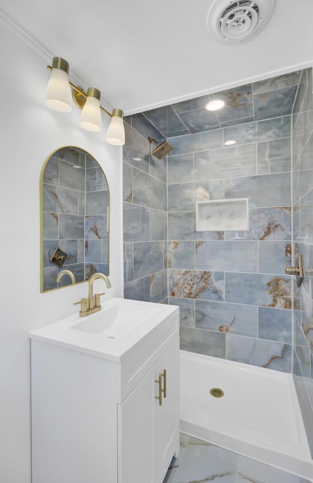 3428 Plaza Ln, North Charleston, SC 29420 - full bathroom featuring vanity, tiled shower, marble look tiles, and crown molding