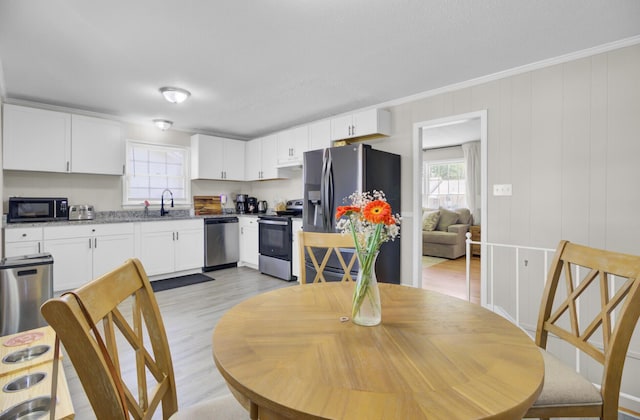 3428 Plaza Ln, North Charleston, SC 29420 - dining space with light wood finished floors
