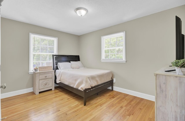 3428 Plaza Ln, North Charleston, SC 29420 - bedroom featuring light wood-style floors and baseboards