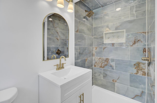 3428 Plaza Ln, North Charleston, SC 29420 - full bathroom with vanity, toilet, and a tile shower