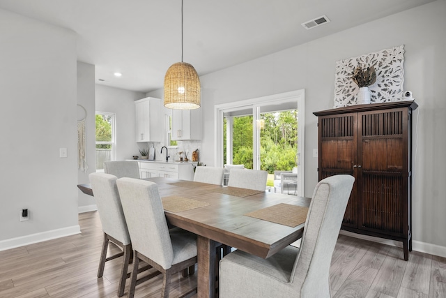 1387 Thin Pine Dr, Johns Island, SC 29455 - dining room with light wood-type flooring, plenty of natural light, baseboards, and recessed lighting