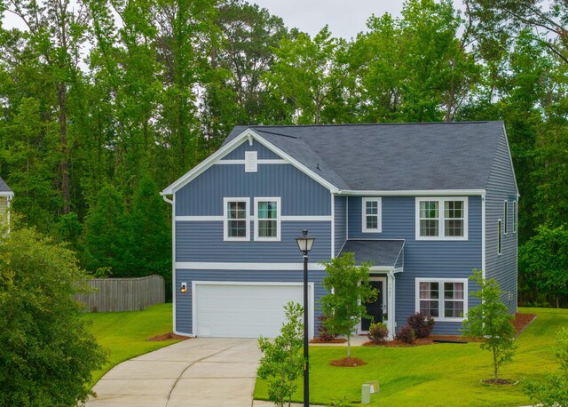 1387 Thin Pine Dr, Johns Island, SC 29455 - traditional-style home with driveway, a garage, roof with shingles, and board and batten siding
