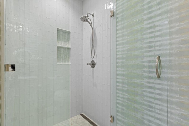 bathroom featuring a stall shower