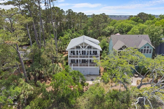 bird's eye view featuring a forest view