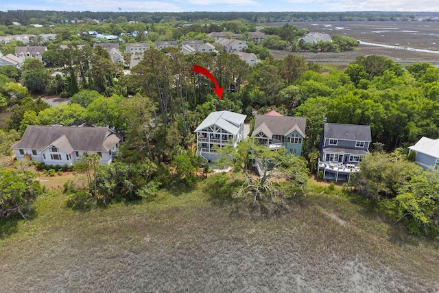 birds eye view of property with a residential view