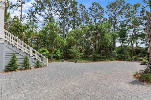 view of patio / terrace featuring stairway