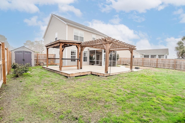 back of property with an outbuilding, a storage unit, a pergola, and a fenced backyard