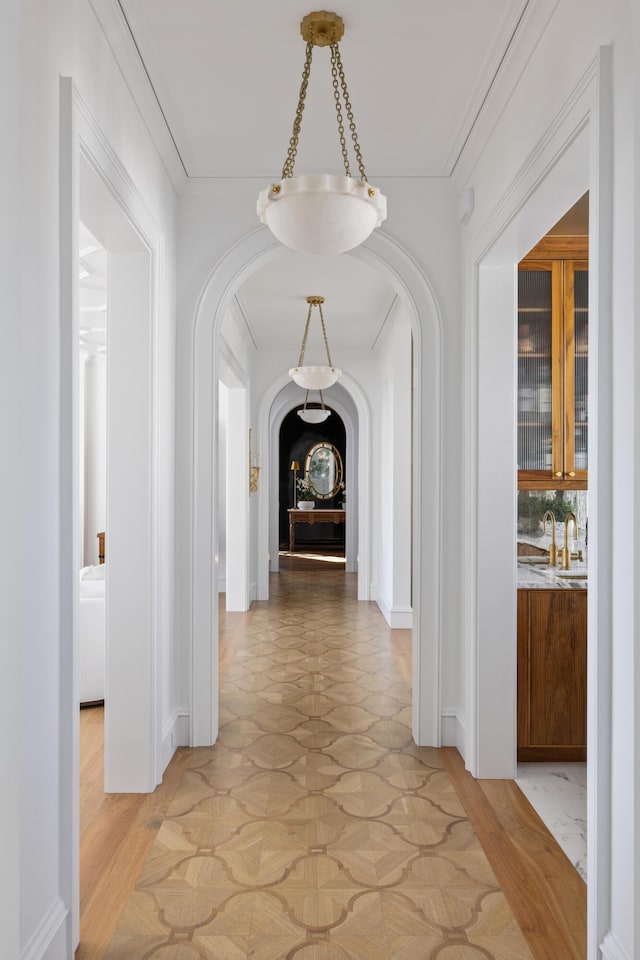 hallway with ornamental molding