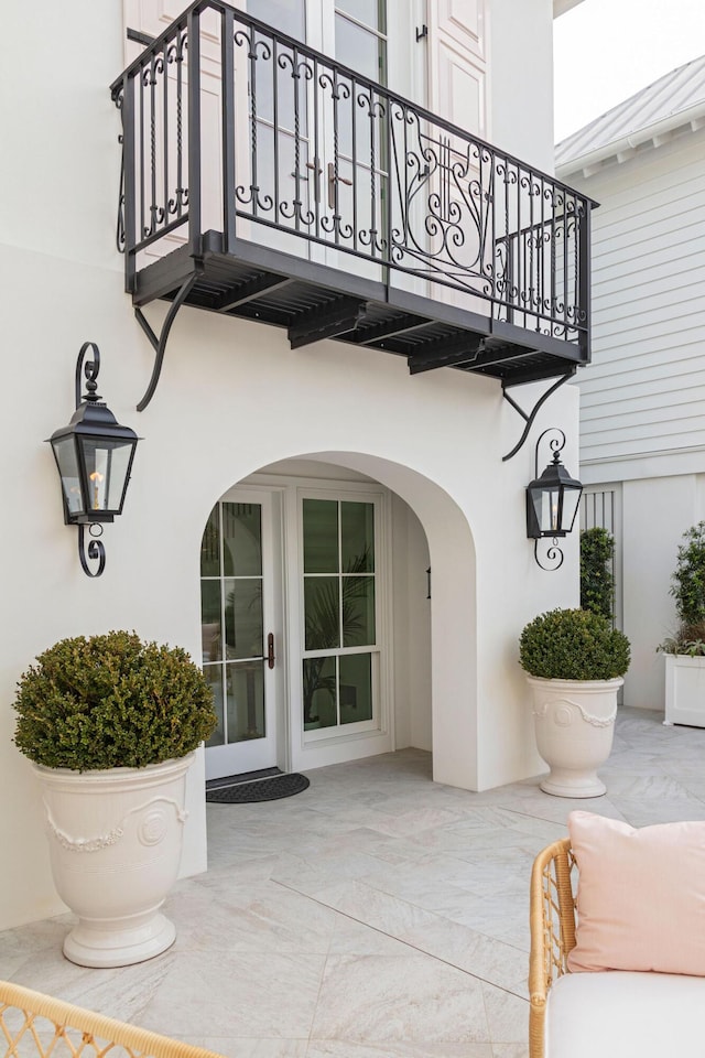 doorway to property with a balcony