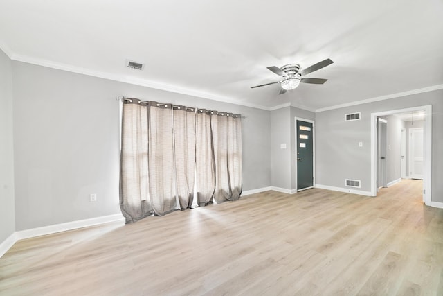 interior space with ceiling fan, light wood-type flooring, and ornamental molding