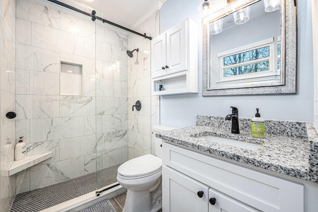 full bath featuring toilet, a stall shower, vanity, and crown molding