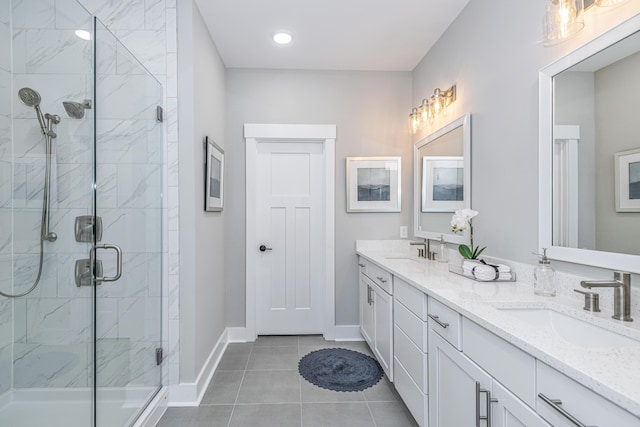 bathroom featuring vanity, tile patterned floors, and walk in shower