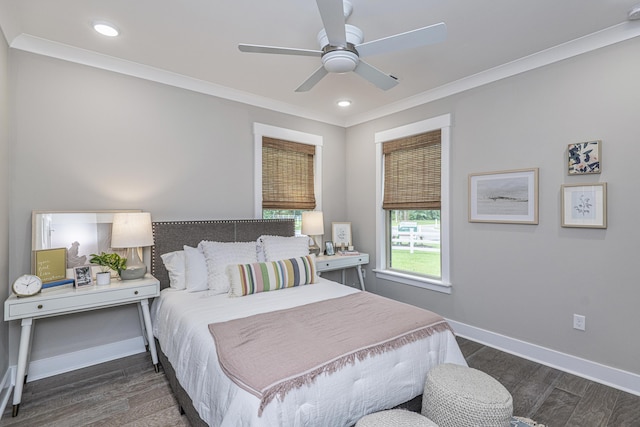 bedroom featuring ceiling fan, ornamental molding, and dark wood-type flooring