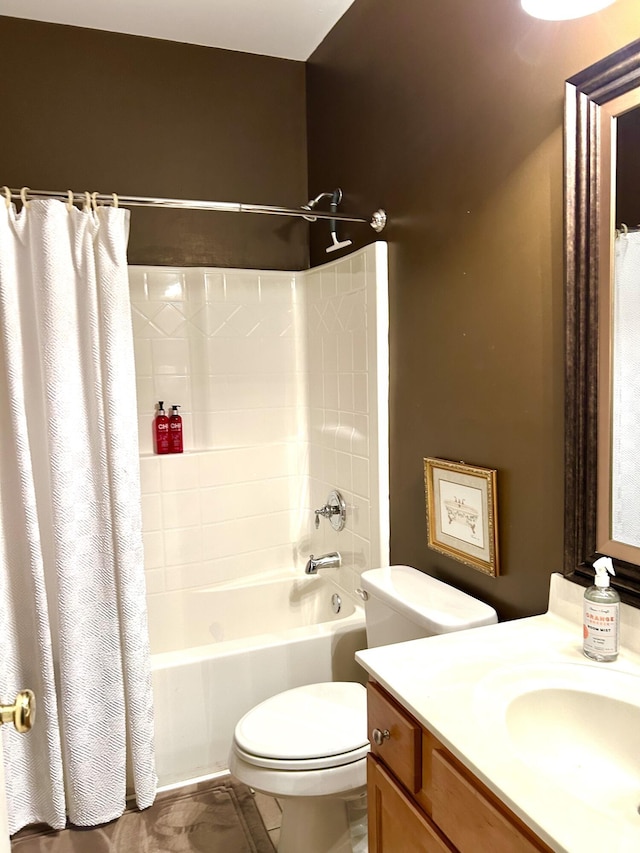 full bathroom with shower / bath combination with curtain, vanity, and toilet