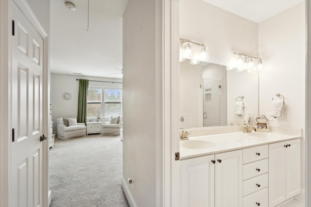 bathroom with vanity and an enclosed shower