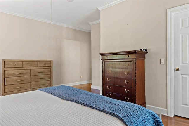 1096 Dunham Rd, Orangeburg, SC 29118 - bedroom with baseboards, ornamental molding, and wood finished floors