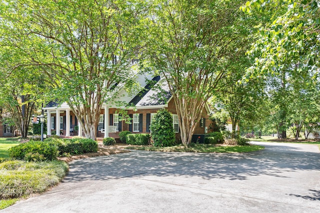 1096 Dunham Rd, Orangeburg, SC 29118 - obstructed view of property with a porch and brick siding