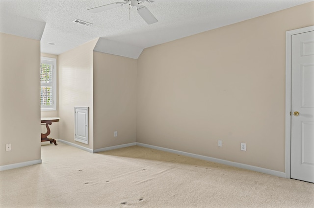 1096 Dunham Rd, Orangeburg, SC 29118 - carpeted empty room featuring a textured ceiling, baseboards, a ceiling fan, and visible vents