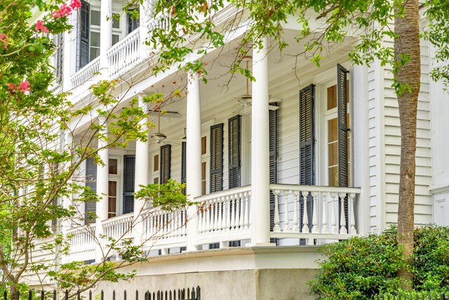 view of home's exterior featuring covered porch and ceiling fan