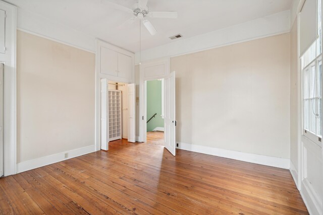 unfurnished bedroom with light hardwood / wood-style flooring and ceiling fan