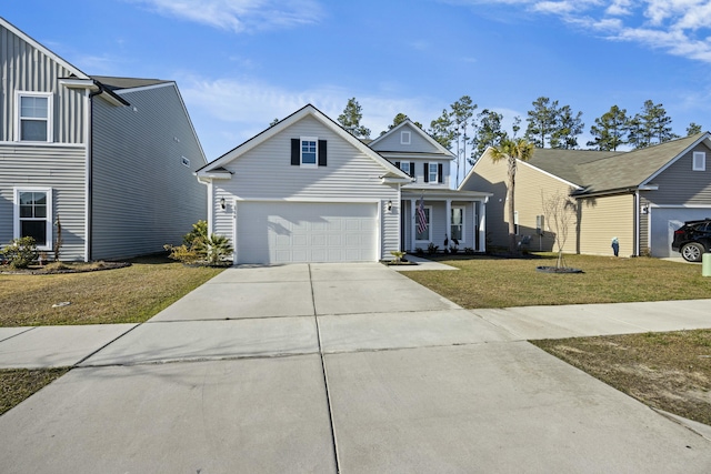 traditional-style house featuring an attached garage, a residential view, a front lawn, and concrete driveway