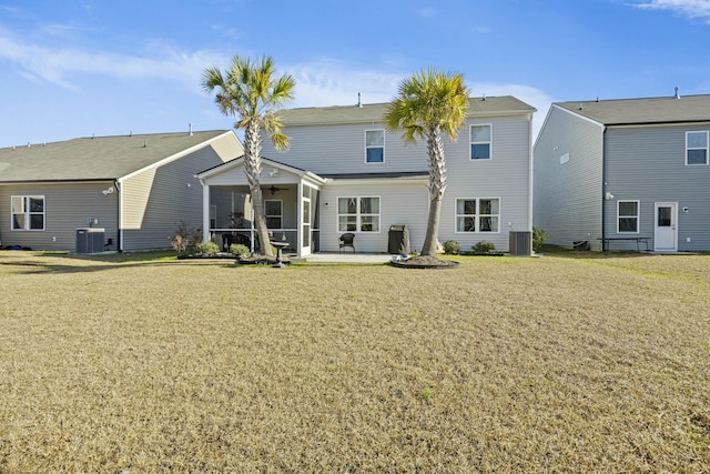 310 Silent Bluff Dr, Summerville, SC 29486 - rear view of house featuring a patio area, central AC unit, and a lawn