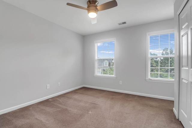 200 Oak Point Landing Dr, Mount Pleasant, SC 29464 - carpeted spare room with baseboards, plenty of natural light, and a ceiling fan