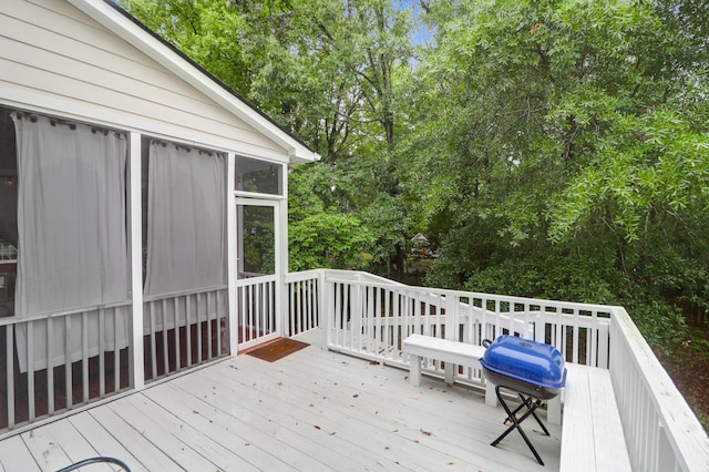 200 Oak Point Landing Dr, Mount Pleasant, SC 29464 - wooden deck featuring a sunroom and view of scattered trees