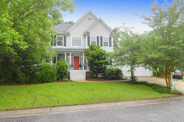200 Oak Point Landing Dr, Mount Pleasant, SC 29464 - view of front facade with concrete driveway, covered porch, and a front lawn