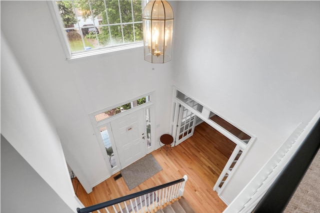 200 Oak Point Landing Dr, Mount Pleasant, SC 29464 - foyer entrance featuring a towering ceiling, a chandelier, and wood finished floors