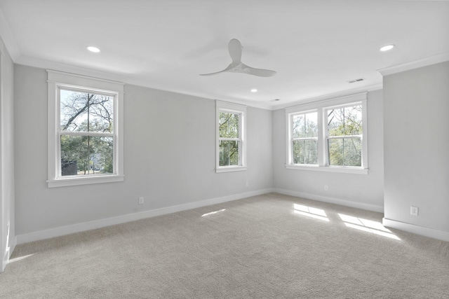 unfurnished room with carpet, baseboards, crown molding, and recessed lighting