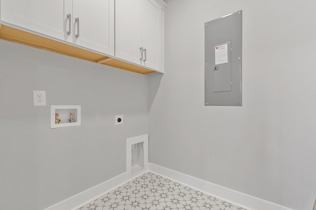 laundry room with washer hookup, cabinet space, electric dryer hookup, electric panel, and baseboards