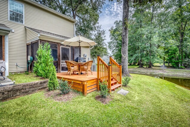 view of yard with a deck