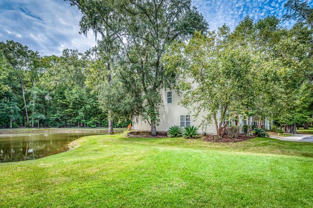 view of yard with a water view