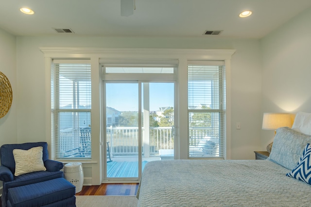 204 Michigan Avenue C-5 - Unit 11, Folly Beach, SC 29439 - bedroom featuring access to outside, multiple windows, wood finished floors, and recessed lighting
