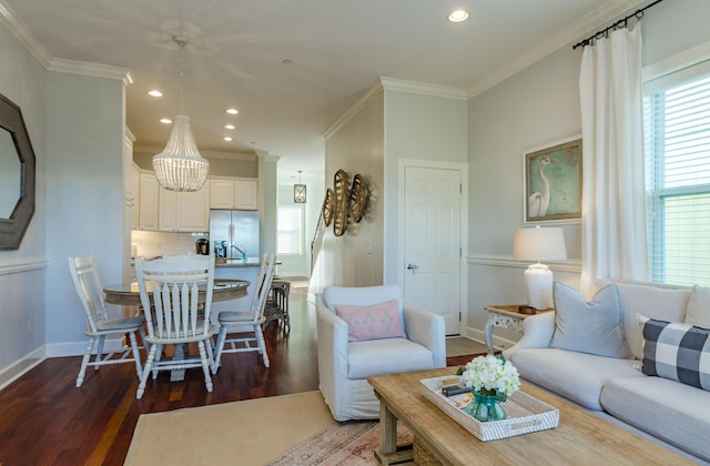 204 Michigan Avenue C-5 - Unit 11, Folly Beach, SC 29439 - living area with wood finished floors, crown molding, recessed lighting, and a chandelier