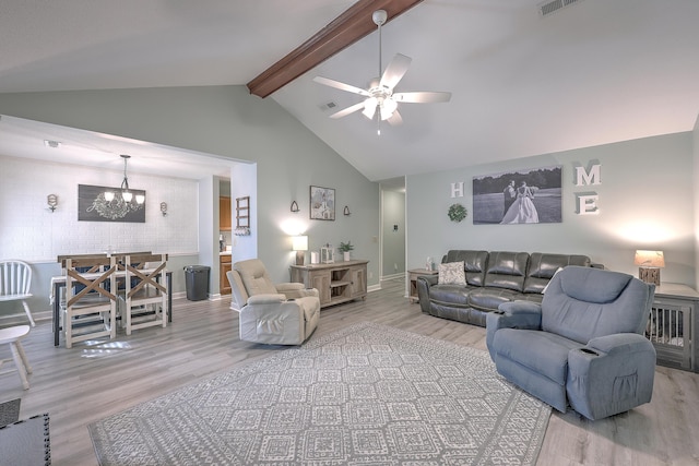 living room featuring ceiling fan with notable chandelier, beam ceiling, light wood-type flooring, and high vaulted ceiling