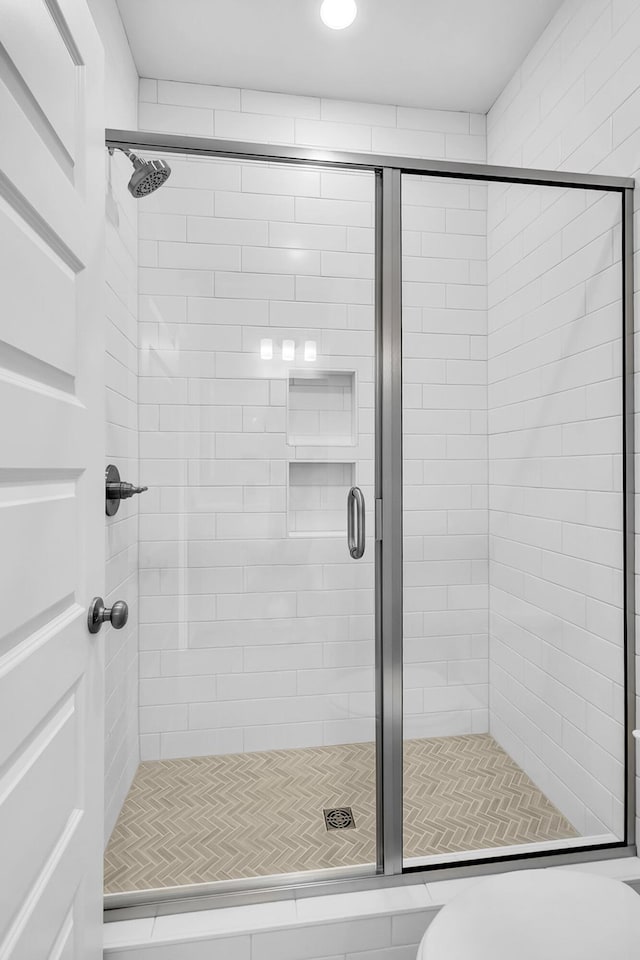 bathroom featuring walk in shower