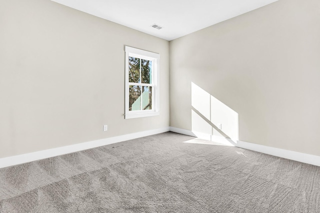 spare room with carpet floors